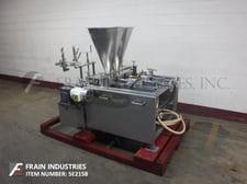 FEMC, twin piston, Stainless Steel filler, 10 to 60 cpm, with Stainless Steel bulk hopper