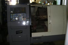 Hardinge #CS-2, 19-1/2" swing, 22" centers, 8.74" cross travel, 6" chuck, Fanuc OT, tailstock, conveyor