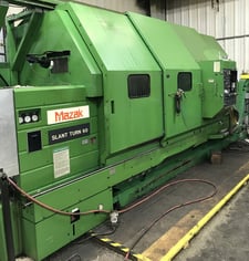 Mazak #Slant-Turn-60U, CNC turning center, 36" swing, 20" chuck, 6.5" spindle bore, 1989