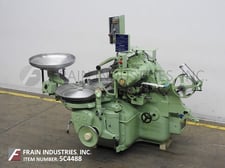 G D #2500, automatic double end twist wrap, 200-500 cpm, will handle a large product range: hard candies