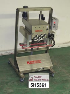 Kiss #VCT-06, semi-automatic, 3 station, 6 spindle quill capper, 60-150 containers per minute, 10mm-110mm