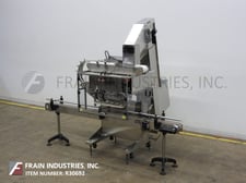 SureKap #SK600, semi-automatic, inline, Stainless Steel, 3 station, 6 spindle roll over conveyor capping