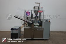 Norden #602, automatic, hot air, plastic or laminate tube filler & sealer, 10-60 tubes per minute, 18 pocket