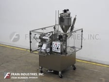World Cup #12-32, automatic, 12 pocket rotary cup filler and sealer, 1 to 32 oz.fill range, A/B PLC, variable
