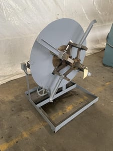 2000 lb. Uncoiler, 10" wide, 40" outside dimensions, 18" ID, forward/reverse control, 110 V.