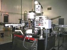 Krones #Canmatic-18, labeler, automatic, 18 head rotary, wrap around, hot melt glue, 100-600
