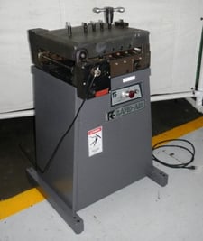 12" x .05" Rapid-Air #SC12, 9 rolls, 0-825 IPM variable speed, loop control, .015"-.050" thick, 115 V., 2001