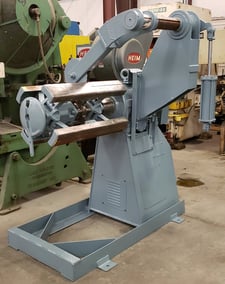 10000 lb. Littell #90-30, 30" width, 48" outside dimensions, 18"-25" ID, automatic centering, reconditioned