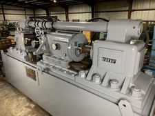 24" Tesker #840, infeed/thrufeed, 20' infeed rolling table, 20' exit rolling table