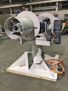 4000 lb. Arku, double end uncoiler, 24" wide, 18"-20" ID, 24" face mendrels, 2000s