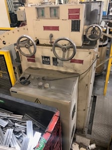 12" x .063" Aida #LS-3028, flat & shape straightener, 7-rolls, loop photo eye, 2.2 HP