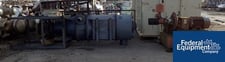 1000-1100 cfm Torit #TD573, 510 sq.ft., Carbon Steel, pulse jet, on legs with blower, serial no.
