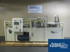 Schroeder #2500, case packer, up to 12 cases/minute, glue seal with Nordson glue pot, serial# 5633, #3109-8