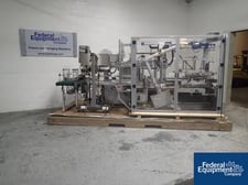 Skinetta #CP145, case packer, servo driven, erects shipper case from flat, side loading, serial #144.03