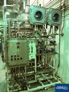 Ionics, Life Sciences RO system, (3) Koch membrane filters, 4" diameter x 48" long, Koch model# 4040, dual UV