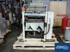 Omega Design #DL27, dual lane shrink bundler, 13-37 bundles/minute, 60-150 containers/minute, right angle