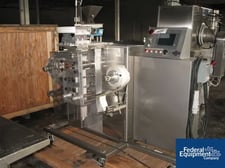 Wrap-ade #VSP-JR, vertical strip packer, Servo driven, Koyo PLC controls, 1/2 HP, 180 V.drive, touch screen