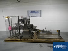 Omega Design #DL27, shrink bundler, to 26 bundles/min or 150 contain./min, 30" W x 11" H x 24" L heated