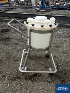 17 gallon Plastic Tank, approx. 18" dia. x 14" straight side, (1) 6", (2) 2" & (2) 1.5" nozzle on top, flat