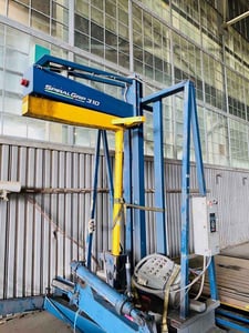 Signode SpiralGrip #310, semi-automatic overhead stretch wrapping system, 12 RPM, approx 35 loads per hour