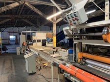 Consani #SAI502, 106" industrial roll rewinder, Allen Bradley Logix5000,1985