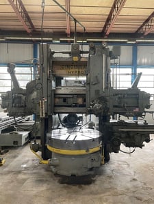 52" Cincinnati #Hypro, vertical boring mill, 4-jaw plain table, 57" swing, 44" under rail, tooling, 30 HP