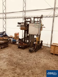 Taylor Products #TEVB-2, drum filling station, 15 drums/hour, 100# capacity, 22.5" diamter x 33" high drum