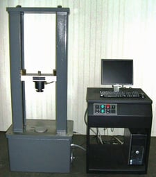 12000 lbf. (53kn) Tinius Olsen #LOCAP, 48" opening, 48" stroke, 15" x 21" table