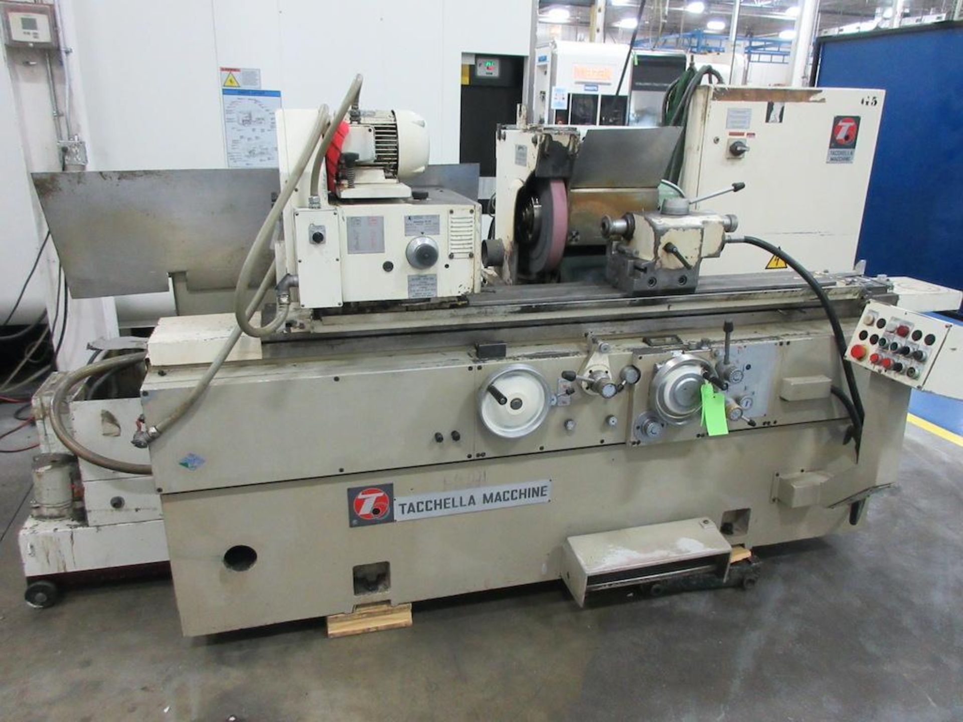 14" x 40" Tacchella #1018UA, 16" diameter x 2" width x 5" hole wheel, hydraulic table traverse, automatic