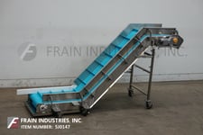 24" wide, Stainless Steel inclined cleated conveyor, 1/2 HP motor drive w/vari-speed, mounted on Stainless