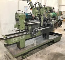 6" x 51" Hey #3, double ended facing & centering machine, 2 pneumatic work hold vises, 1972