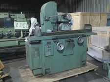 12" x 9" Thompson Surface Grinder, 8" x 32" table, 1' x 9" wheel, automatic cycle, trueing device