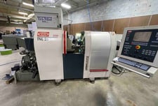 Traub #TNL26, Swiss Lathe, LNS Bar Feeder, Mist Collector, Conveyor, 34 Tools, 2001