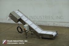 Ohlson #VFFX-35, Stainless Steel inclined cleated conveyor, 10" wide x 69" long belt with 1-1/4" high cleats
