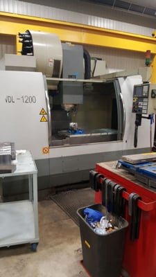 DMTG #VDL1200, vertical machining center, 6000 RPM, #50 taper, 600mm x 1200mm table, 13000 power on hours