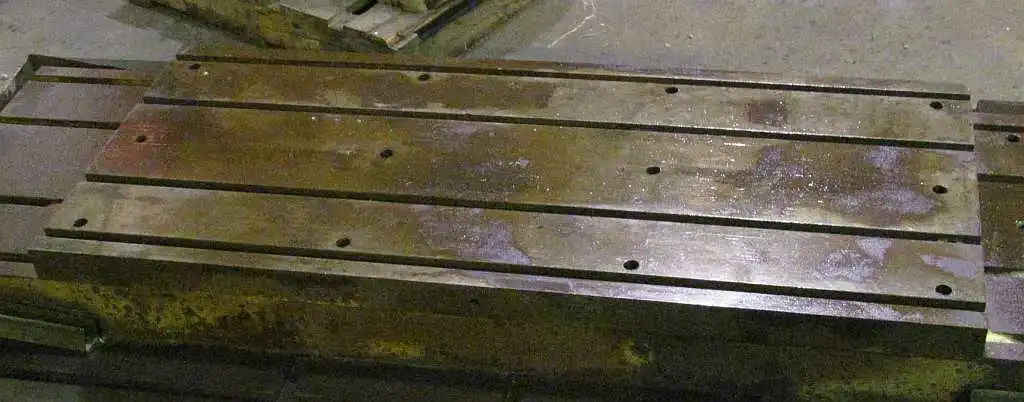 21" x 48" x 2" steel, T-slotted machine plate
