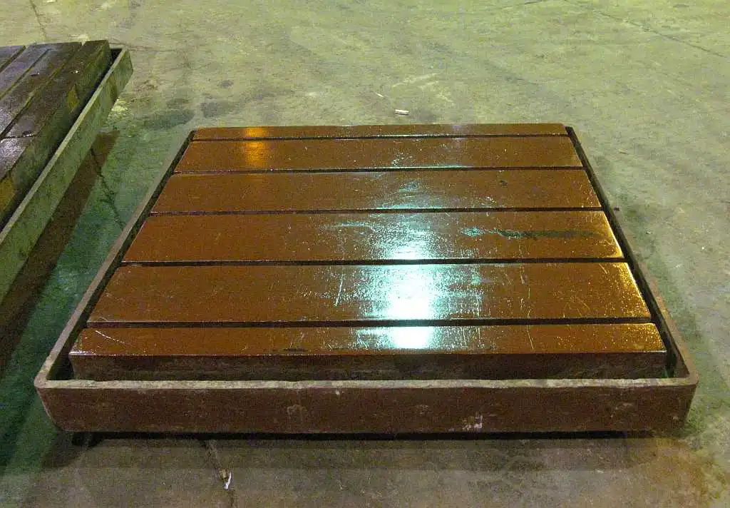 55" x 60" x 9" T-slotted floor plate, coolant trough