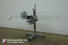 Label-Aire #3114TS, pressure sensitive, blow tamp spot labeler, control with touch screen HMI, mounted on