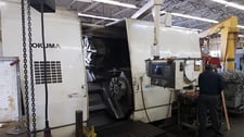 Okuma #LU-45, CNC lathe, 35.5" swing, 21" chuck, 3.5" bar, 25.98" diameter, 39.34" length, OSP7000L, chip