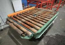 10000 lb. Banding line exit conveyor, 54" roll face, 3.5" diameter rolls, 6.5" centers, 22" passline