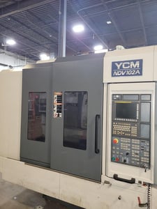 YCM #NDV102A, CNC vertical machining center, 30 automatic tool changer, 40" X, 23.6" Y, 23.6" Z, 15000 RPM