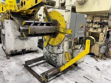 10000 lb. Air Feeds #R100, motorized coil reel, 30" width, 60" outside dimensions, 16"-20" ID, 3-leaf mandrel