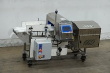 Loma #IQ4-4.5x13.5, automatic, inline, Stainless Steel conveyor thru metal detector, mounted on 4 leg base