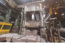 5500 Ton, Innse, 4 post hydraulic press, single cylinder design, revamped 2005