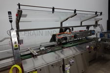 Kliklock #Vari-Right, In-line, Tri-Seal top load carton closer rated from 30-200 cartons per minute, mounted