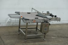 Dabrico #DFD50, Stainless Steel, table top belt unscrambleing acummulation conveyor, 16" L x 16" W platform