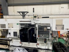 Muratec #MW200, 10" chuck, A2-6 spindle, single gantry loader, chip conveyor, 2002