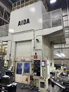 3000 Ton, Aida #PK-3000, knuckle motion stamping press, 9.8" stroke, 47.24" x47.24" bed area, 25-40 SPM