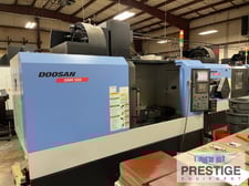 Daewoo Doosan #DNM-500, 40" X, 20" Y, 47" x21" table, 8000 RPM, Cat 40, Fanuc i, 30 automatic tool changer