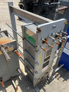 140 sq.ft., APV, vertical 304l Stainless Steel plate heat exchang, 150fv psi, 329&deg;F, 2015, #113206